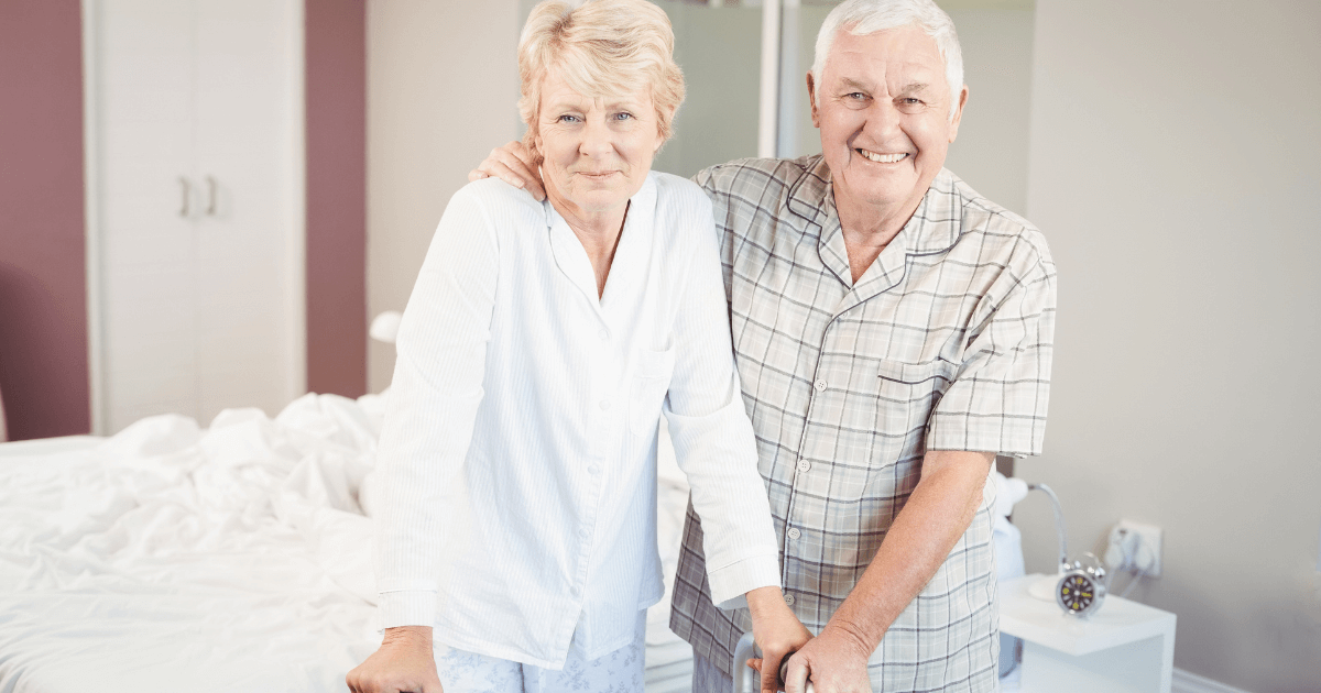 Elder couple and man arm around woman looking at the cost of assisted living